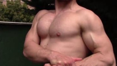muscle hunk posing