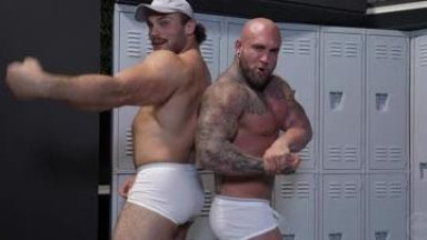 Bodybuilders massaging each other