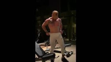 handsome musclu guy showing off