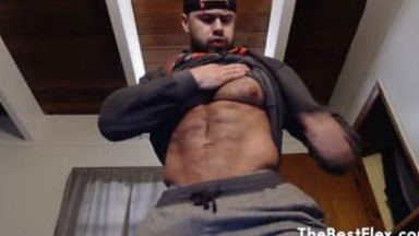 hairy muscle guy flexing