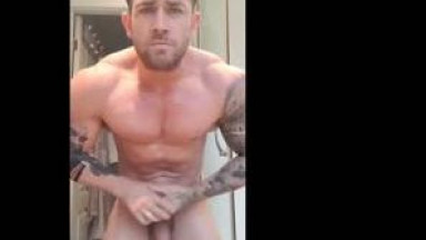 tatted british muscle man showing off