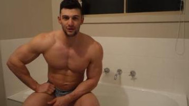 Handsome guy takes a bath