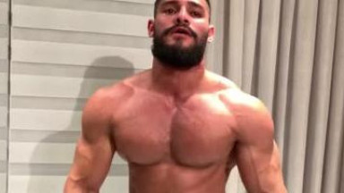 Rodrigo pumps his muscles and breaks the chain