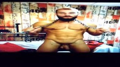 Nude posing with chain