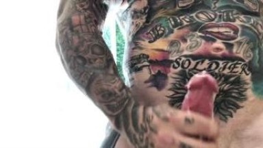 tattooed satisfies himself
