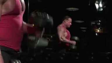 Muscular man having quick jerk after gym