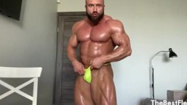 Oiled Up Bodybuilder Jerking Off