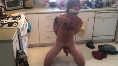 Young long haired man with big cock catched and tied