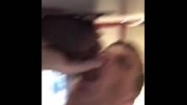 Sucking dicks at a gloryhole