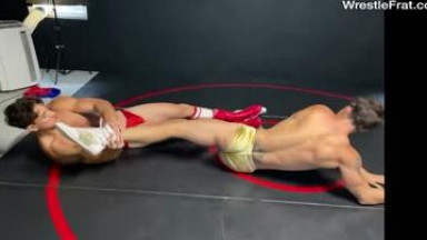 Two muscle hunks wrestle