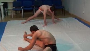 Steve and Dark wrestling