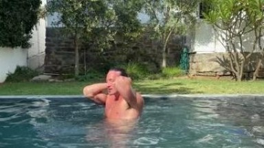 Hunk swimming naked