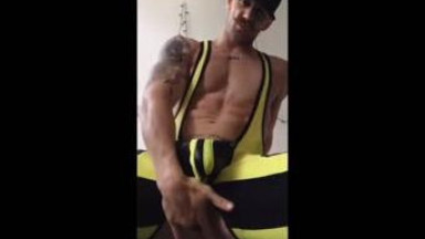 guy with mustaches showing off
