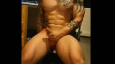 Muscle guy jerking with device